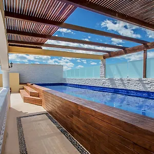We Playa Albergue